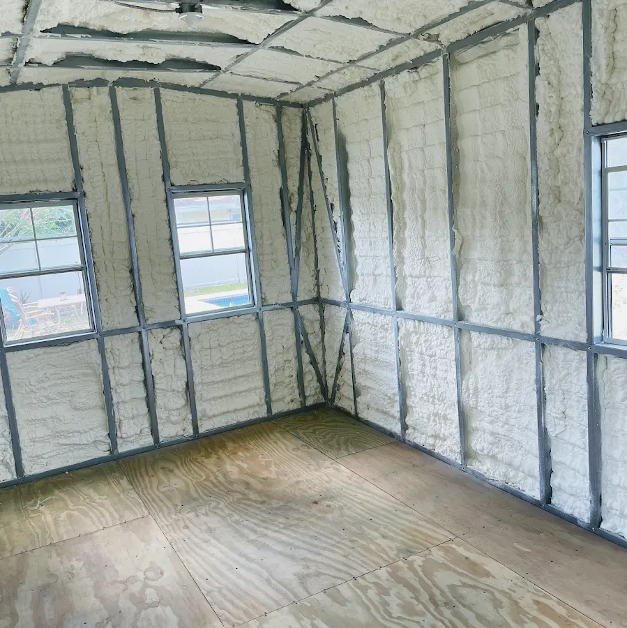 Closed-cell spray foam insulation applied to wall cavities in a residential project in Sayreville